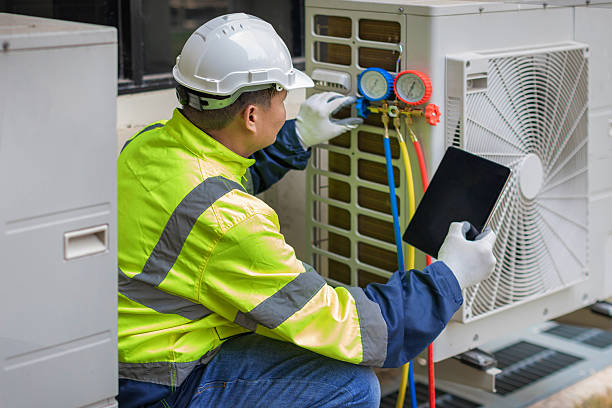 Professional Heat Pump Repair technician working in Ledyard, CT